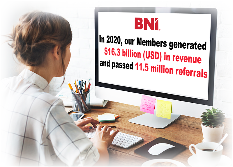 BNI Memeber siting in fron of a computer using BNI Online